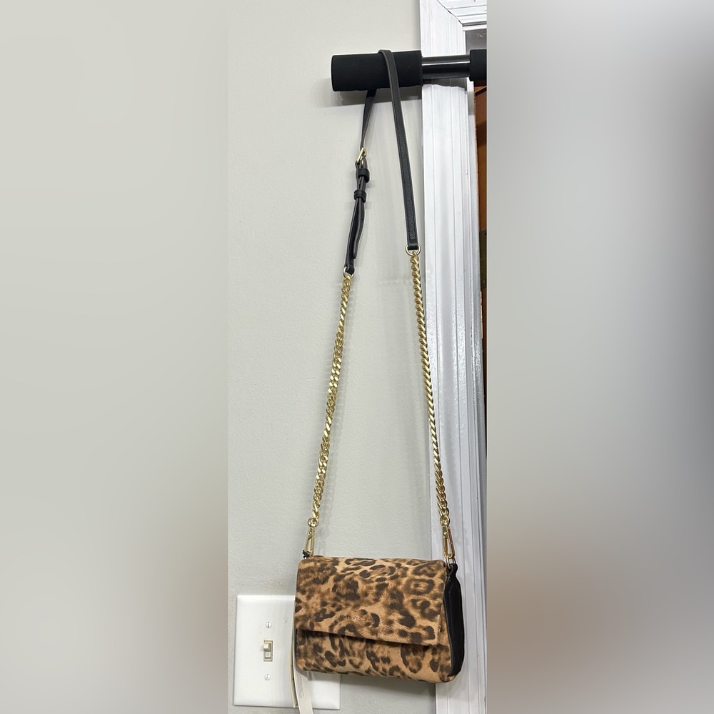 New with tags and dust bag. 8x4.5x12 inches